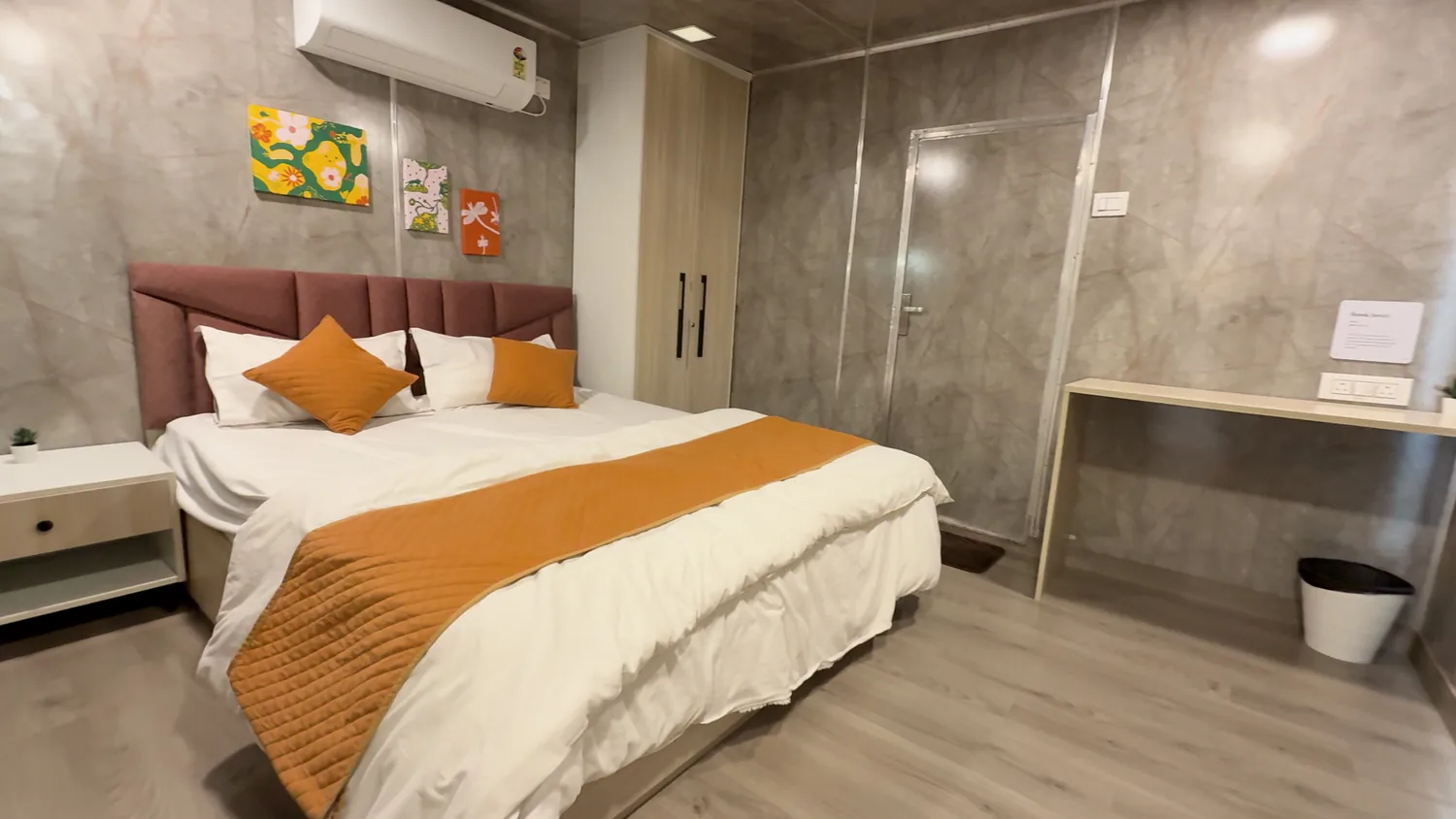 Boutique-style en-suite bedroom inside the container Airbnb — CabinWala