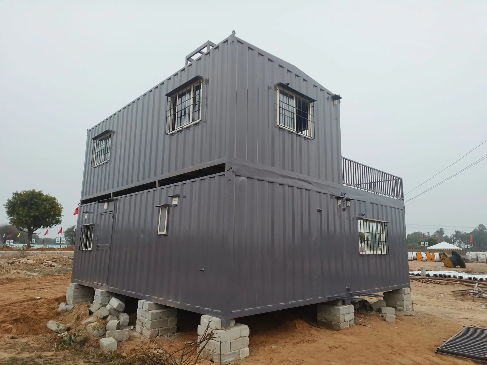 Container farm house structure viewed from the side, on-site